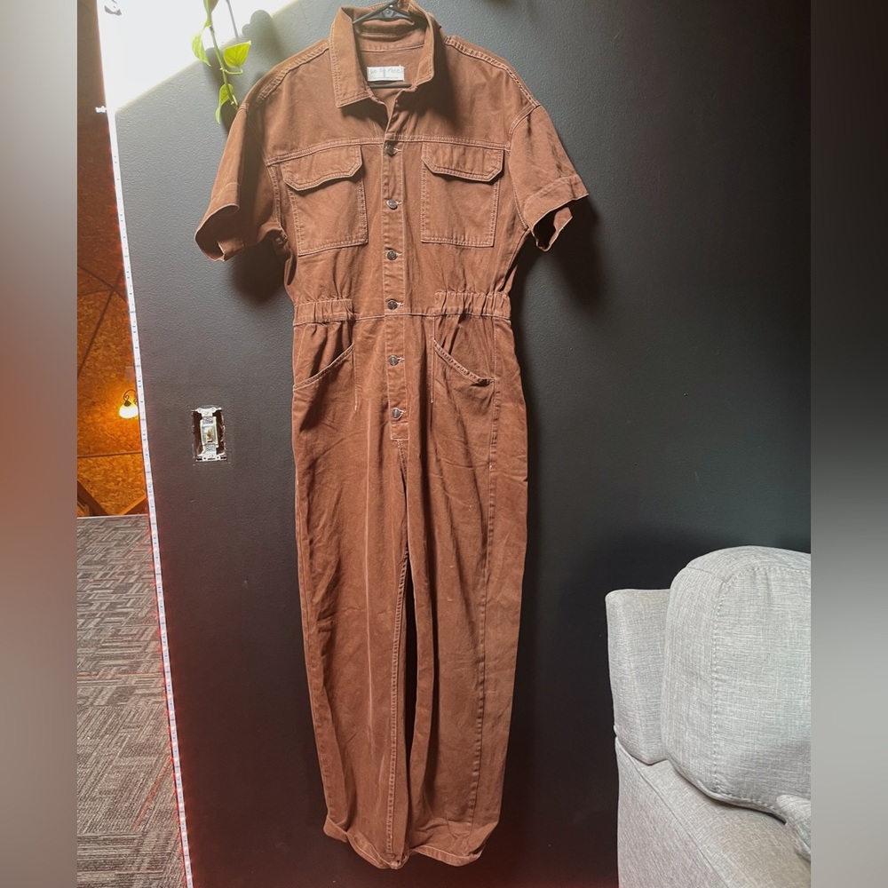Brown free people jumpsuit.